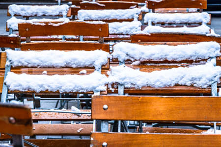 table and chair at a sidewalk cafeの写真素材