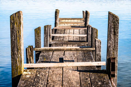 old wooden jetty at the ammersee lakeの写真素材