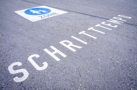 typical pedestrian road sign - photo - translation: walking pace