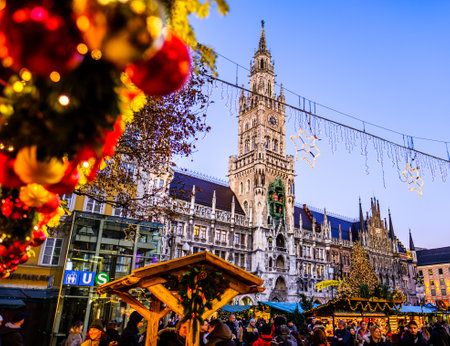 Munich, Germany - December 3: people and typical sales booth at the christmas market on December 3, 2019 in Munich, Germanyのeditorial素材
