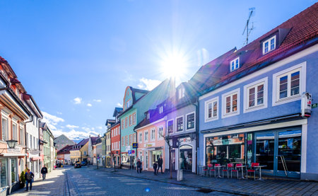 murnau, Germany - March 1: some people visiting the famous old town called untermarkt on March 1,...