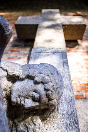 old cross at a cemetery