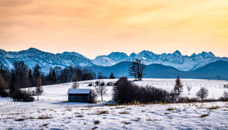 view from bad toelz to the karwendel mountains in winterの写真素材