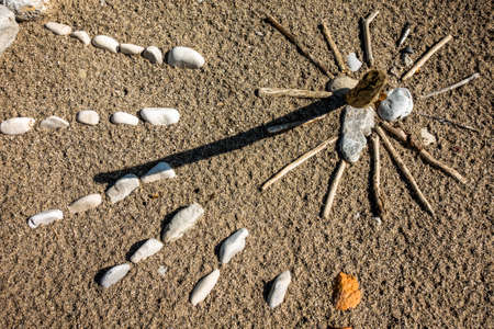rock sundial at a beach