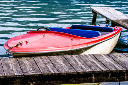 old boat at a lake in austriaの写真素材