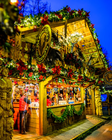 Munich, Germany - December 5: people and sales booth at the christmas market on December 5, 2019 in Munich, Germanyのeditorial素材