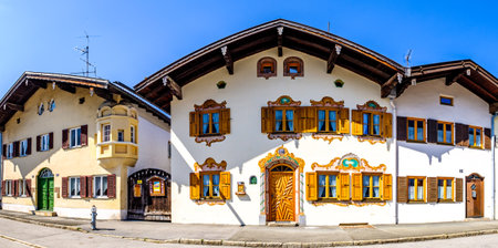 Mittenwald, Germany - April 7: famous old town with historic buildings in Mittenwald on April 7, 2020のeditorial素材