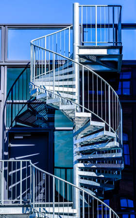 old spiral staircase at a buildingの写真素材