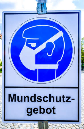 sign for protective mask in germany - translation: bidding for wearing a protective maskの写真素材