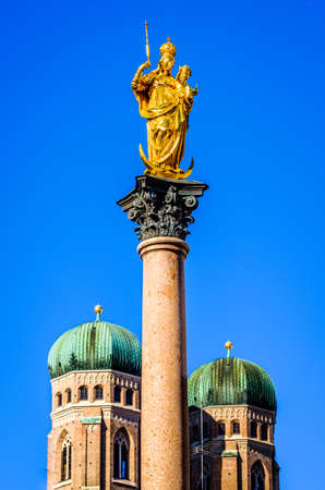 famous virgin mary column at the marienplatz in munich - bavariaの写真素材