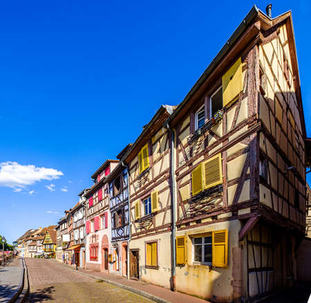 famous old town with historic halftimbered facades in colmar - franceの写真素材