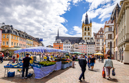 Trier, Germany - July 6: historic buildings and tourists at the famous old town of Trier in Germany on July 6, 2020のeditorial素材