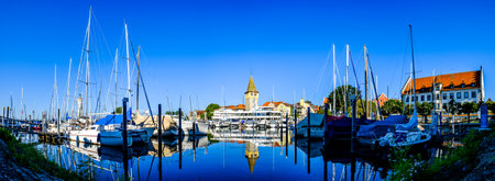 Lindau, Germany - August 6: famous harbor with sailboats at the historic island of Lindau am Bodensee on August 6, 2020のeditorial素材