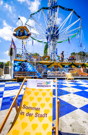 Munich, Germany - August 16: Carousel and people during the "summer in the city" event in Munich on August 16, 2020のeditorial素材