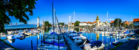 Lindau, Germany - August 6: famous harbor with sailboats at the historic island of Lindau am Bodensee on August 6, 2020のeditorial素材