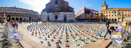 Bologna, Italy - October, 10: Participants in the action "riempi il piatto vuoto" (translation: "fill the empty plate") by Caritas and CEFA while collecting food for the needy on Piazza Maggiore in Bologna on October 10, 2020のeditorial素材