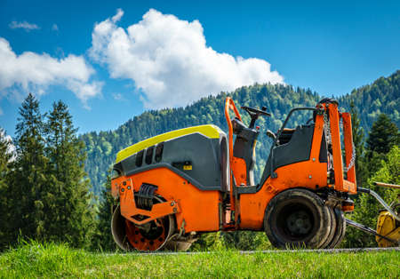 road roller at a construction site - photoの写真素材