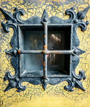 old window at a facade - photo