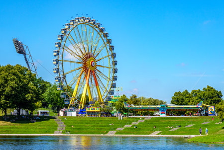 Munich, Germany - August 16: Carousel and people during the "summer in the city" event in Munich Olympiapark on August 16, 2020のeditorial素材