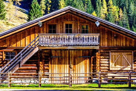 typical old bavarian farmhouse at the european alps