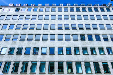 modern office building with reflections - photoの写真素材