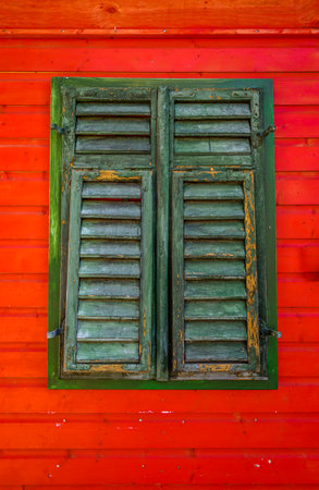 old window at a facade - photo