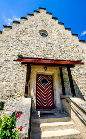 old wooden door at a house - photoの写真素材