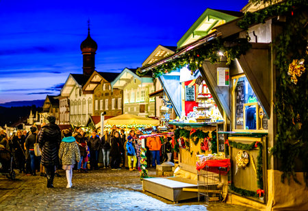 Bad Toelz, Germany - December 18: sales booths at the famous christmas market between the old facades in the old town on December 18, 2019 in Bad Toelzのeditorial素材