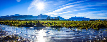 typical frozen puddle close upの写真素材