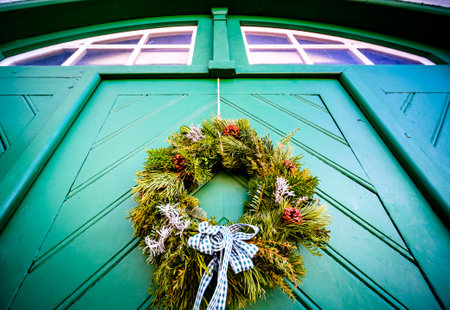 typical old wreath at a doorの写真素材