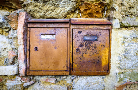 old letterbox at a door - photoの写真素材