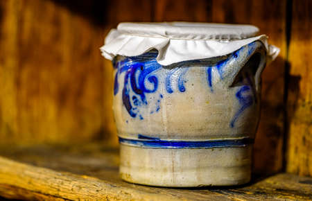 old cooking pot at a shelf
