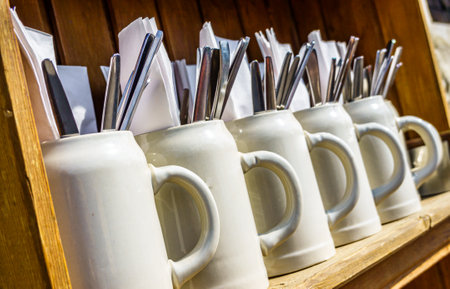 silverware in a beer mug - bavarian beergardenの写真素材