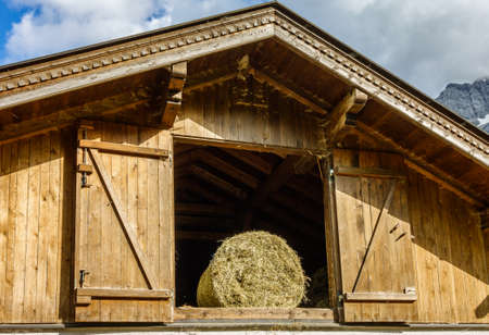 hay bales at a farm - austriaの写真素材