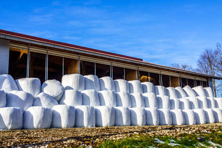 hay bales at a farm - austriaの写真素材
