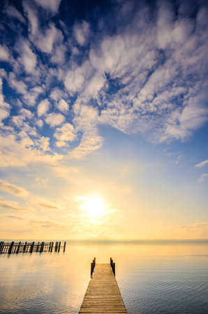old wooden jetty at a lake in bavaria - germanyの写真素材