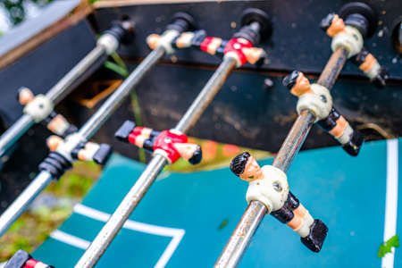old damaged table soccer - foosball - photo