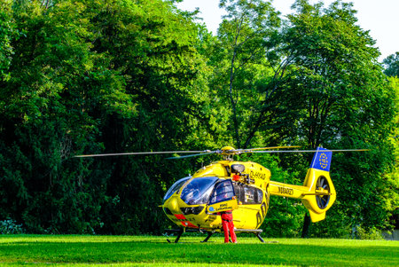 Tutzing, Germany - August 15: typical rescue helicopter of the ADAC in Tutzing on August 15, 2021のeditorial素材