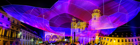 Munich, Germany - September 10: Audience at the Mercedes-Benz booth at the IAA (Internationale Auto Ausstellung - translation: international auto exhibition) trade fair and Art Net "Earthtime 1.26" from Janet Echelmanin in Munich on September 10, 2021のeditorial素材