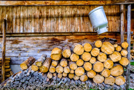heap of firewood at a farm - photoの写真素材