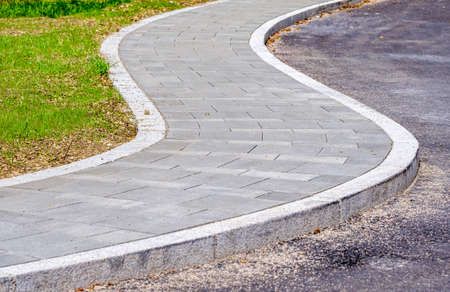 sidewalk construction with paving stonesの写真素材