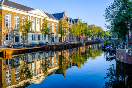 Amsterdam, Nethterlands - October 9: historic buildings at the old town of Amsterdam on October 9, 2021のeditorial素材