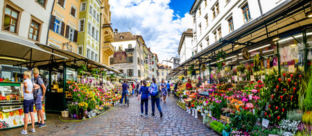 Bozen, Italy - September 20: historic buildings and people at the old town of Bozen on September 20, 2021のeditorial素材