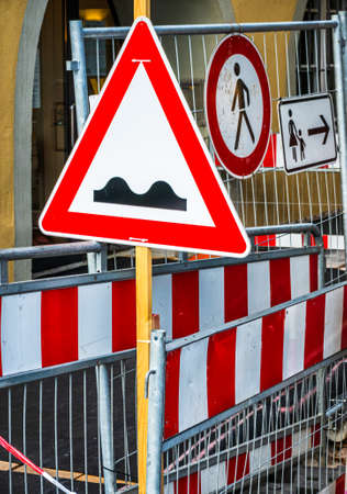 men at work warning sign in Germanyの写真素材