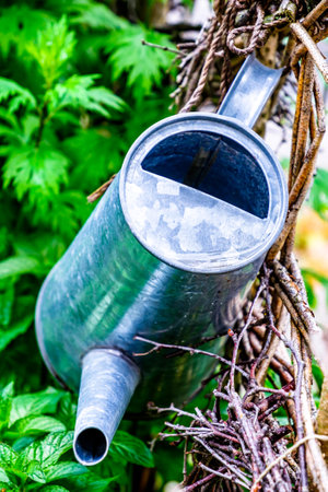 old watering can - photo - close upの写真素材
