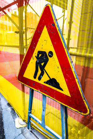 men at work warning sign in Germanyの写真素材