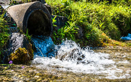 dewatering tube at a river - photoの写真素材