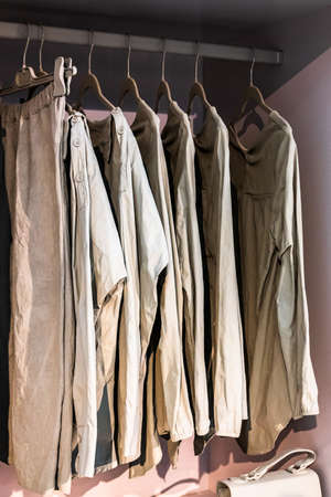 clothes hanging at a clothes rail - photoの写真素材