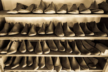 shoemaking with old shoe lasts - photo
