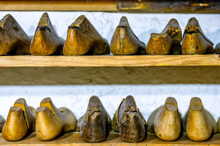 shoemaking with old shoe lasts - photo